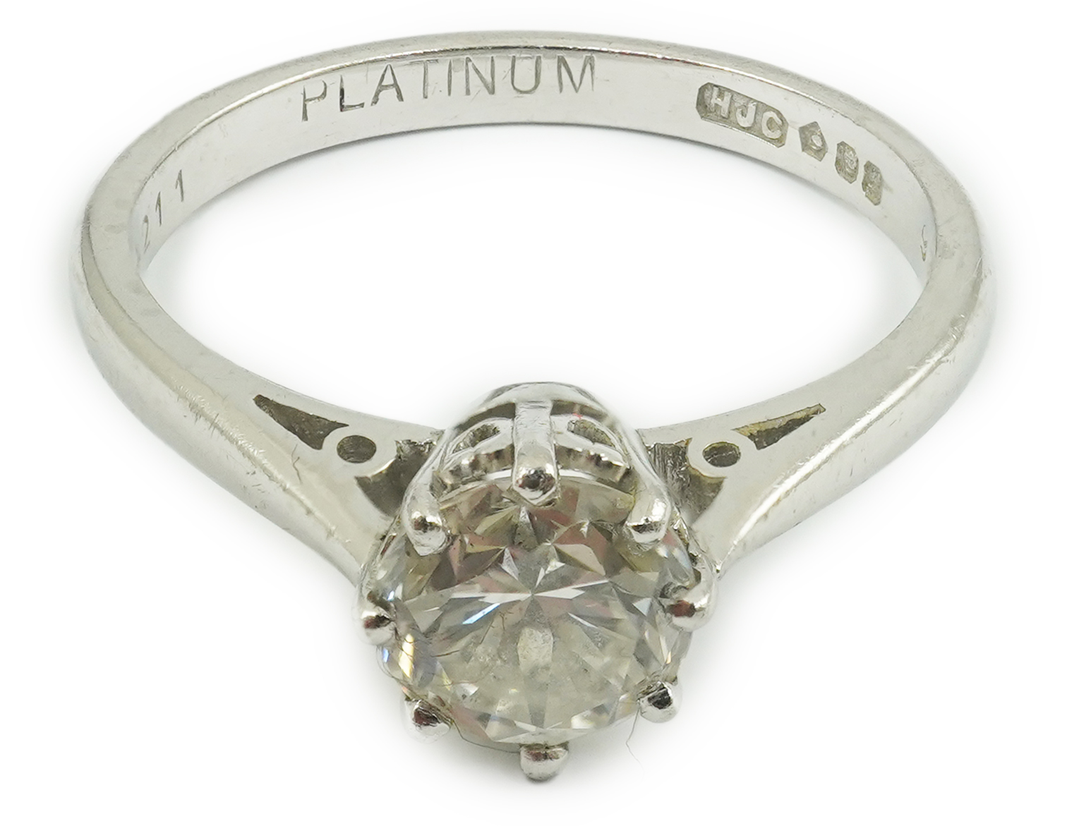 A modern platinum and solitaire diamond set ring